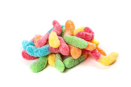Sour gummy worms isolated on a white backgroundの写真素材
