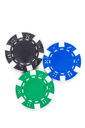 Black, green, and blue poker chips isolated on a white backgroundの写真素材