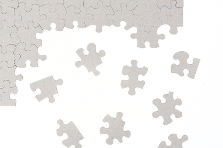 Blank puzzle partially completed isolated on white backgroundの写真素材
