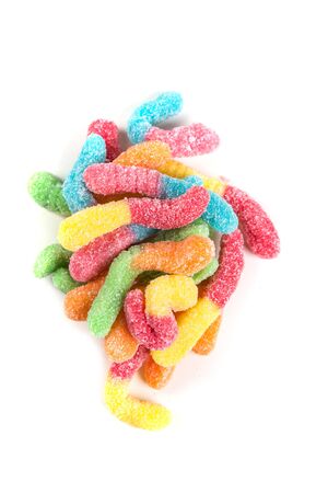 Sour gummy worms isolated on a white backgroundの写真素材