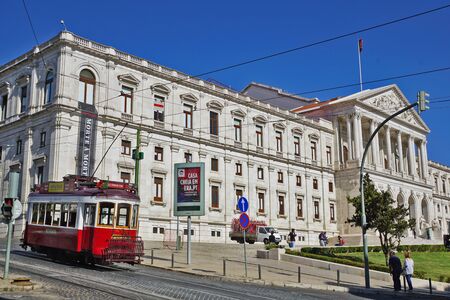 September 15th 2017, Lisbon, Portugal:  Parliament building in Lisbon with historic tramの写真素材