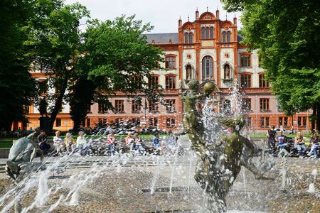 Old University of Rostock with fountain in the foregroundのeditorial素材