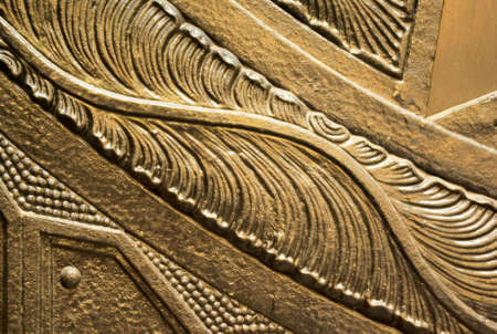 Feather design in wrought iron on the door of an Art Deco apartment house in Budapest の写真素材