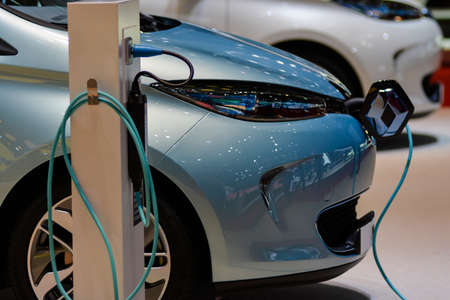 Renault ZOE EV and charging station on display during the Geneva Motor Show, Geneva, Switzerland,...