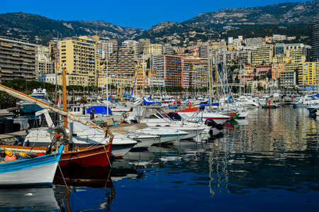 The cities largest harbor, Port Hercule, has boats of every size from dingy to mega yacht, Monte Carlo, Monaco on March 12 2014.のeditorial素材