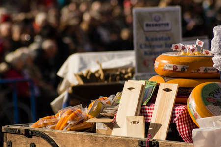ALKMAAR, NETHERLANDS - APRIL 10: The centuries old cheese market in Alkmaar is by far the towns biggest tourist attraction. Every Friday morning from April through September at 10:00 the Waagplein (weighing square) comes to life, full of vendors sellingのeditorial素材