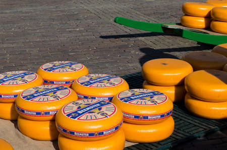 ALKMAAR, NETHERLANDS - APRIL 11: The centuries old cheese market in Alkmaar is by far the towns biggest tourist attraction. Every Friday morning from April through September at 10:00 the Waagplein (âweighing squareâ) comes to life, full of vendors selのeditorial素材