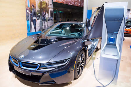 Detroit, MI, USA - January 12, 2015: BMW i8 electric supercar and charging station on display during the 2015 Detroit International Auto Show at the COBO Center in downtown Detroit.のeditorial素材