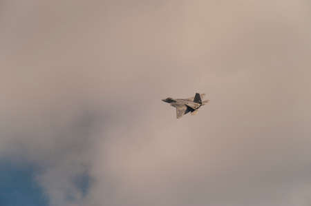 CAMP SPRINGS, MD, USA - SEPTEMBER 19, 2015: The F-22 performs during the 2015 Joint Base Andrews Air Show held at Joint Base Andrews in Camp Springs Maryland.のeditorial素材
