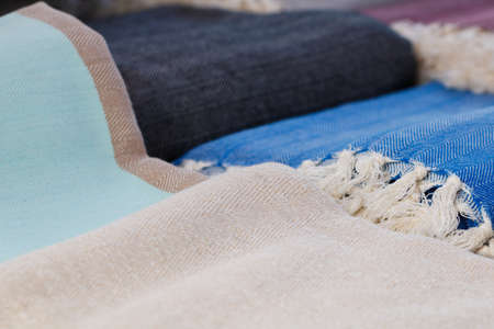 Close-up of colored female wool warm scarves