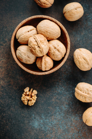 Top view on a heap of walnuts on a table.の写真素材
