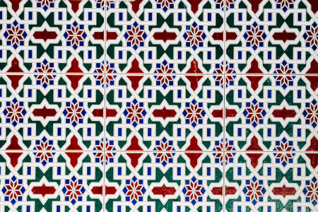 Vibrant geometric pattern in mediterranean style on wall tiles in Marbella, Spain