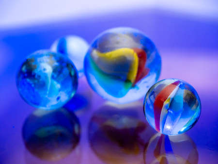 Glass marbles. Child's play.の写真素材