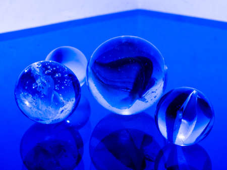 Glass marbles. Child's play.の写真素材