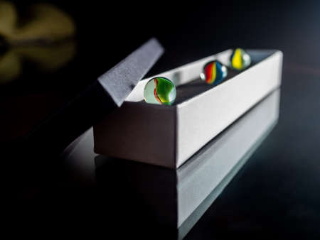 Glass marbles. Child's play.の写真素材