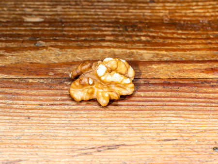 Nut, dried fruit, very hard shell and edible and very fatty seed, produced by walnut.