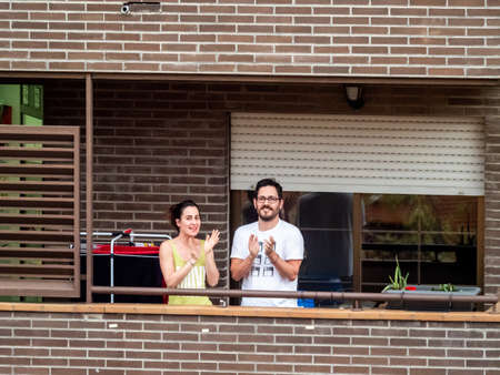 Madrid, Spain - 29 March 2020: State of alarm in Spain on Covid-19 applause from the balconies.のeditorial素材