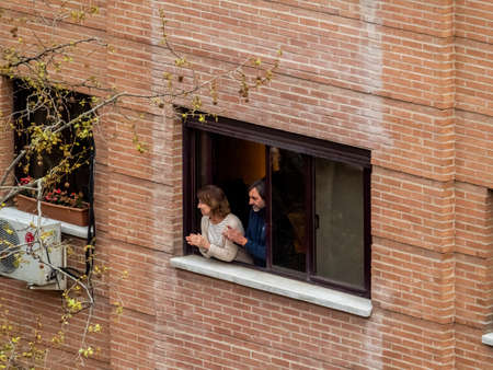 Madrid, Spain - 29 March 2020: State of alarm in Spain on Covid-19 applause from the balconies.