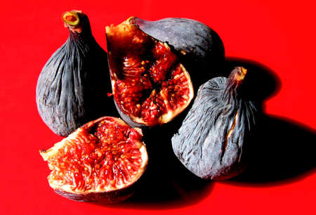 Figs still life, very sweet summer fruit produced by the fig tree.