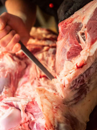 Exploded meat in a butcher shop for sale to the public.の写真素材