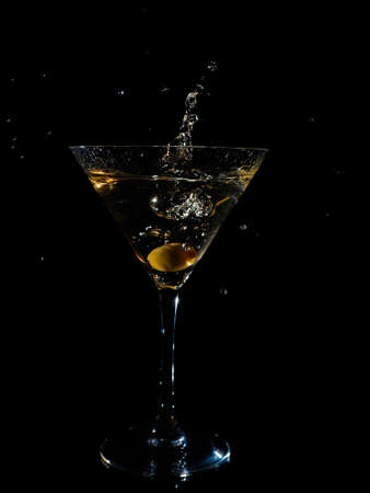 Dry Martini glass on black backgroundの写真素材
