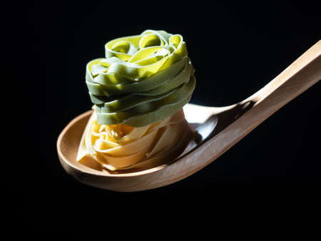 Hard pasta made from wheat flour, typical food from Italy, with great calorific value and high content of fast absorbing carbohydrates.の写真素材