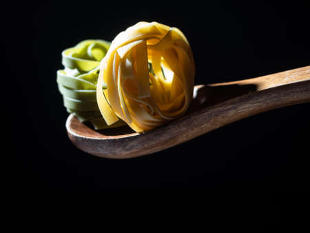 Hard pasta made from wheat flour, typical food from Italy, with great calorific value and high content of fast absorbing carbohydrates.の写真素材