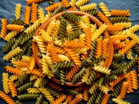 Hard pasta made from wheat flour, typical food from Italy, with great calorific value and high content of fast absorbing carbohydrates.の写真素材