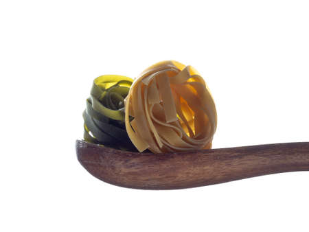 Hard pasta made from wheat flour, typical food from Italy, with great calorific value and high content of fast absorbing carbohydrates.の写真素材