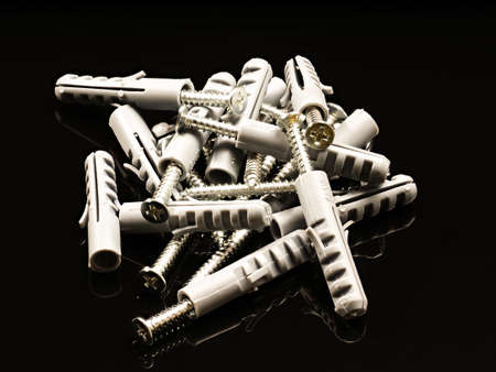 Screws and nuts of different types of threadsの写真素材