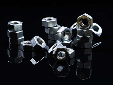 Screws and nuts of different types of threads