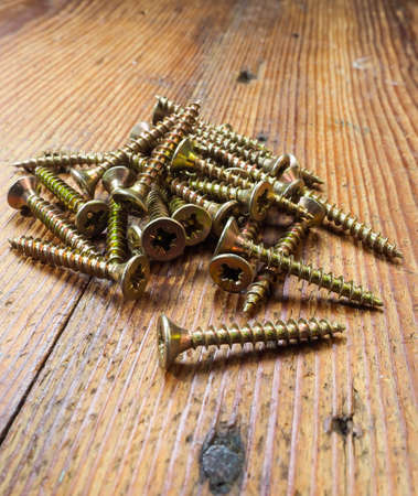 Screws and nuts of different types of threadsの写真素材