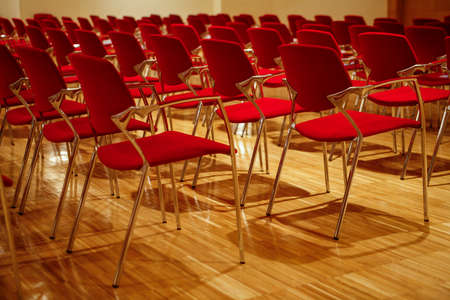 Rows of empty chairs waiting for the public.の写真素材