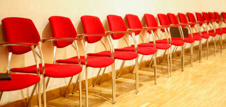 Rows of empty chairs waiting for the public.の写真素材