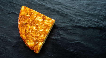 Potato omelette dish traditional Spanish food based on eggs, potatoes and onionsの写真素材