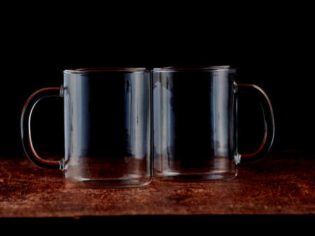 Silhouettes of a group of empty crystal glassesの写真素材