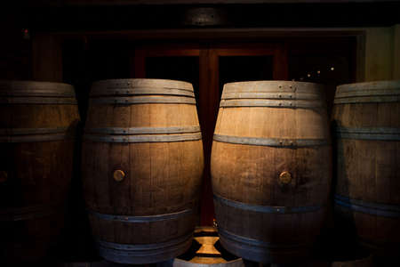 Barrels of South African wine in a wine cellarの写真素材