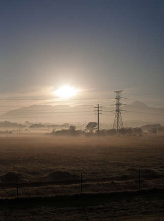 Fields and power lines near Cape Town, South Africaの写真素材