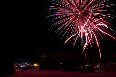 Fireworks at a ski resort in British Columbia, Canadaの写真素材