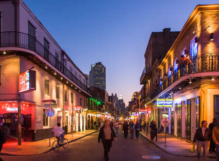 NEW ORLEANS, USA - CIRCA MARCH 2008: Crowds of people and neon lights at dusk circa March 2008 in New Orleans, USA. Tourism is the area's major source of income after Hurricane Katrina in 2005.のeditorial素材
