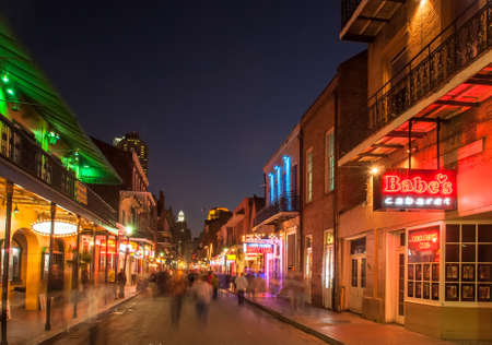 NEW ORLEANS, USA - CIRCA MARCH 2008: Crowds of people and neon lights at dusk circa March 2008 in New Orleans, USA. Tourism is the area's major source of income after Hurricane Katrina in 2005.のeditorial素材