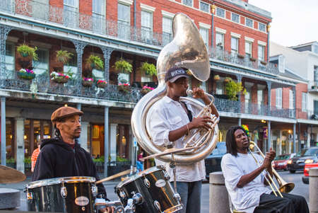 NEW ORLEANS, USA - CIRCA MARCH 2008: One of New Orleans' many jazz bands performs in front of the Cafe Du Monde circa March 2008 in New Orleans, USA. Tourism is the area's major source of income after Hurricane Katrina in 2005.のeditorial素材