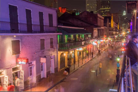 NEW ORLEANS, USA - CIRCA MARCH 2008: Crowds of people and neon lights at dusk circa March 2008 in New Orleans, USA. Tourism is the area's major source of income after Hurricane Katrina in 2005.のeditorial素材