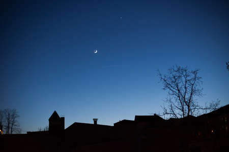 Skyline of houses silhouetted at night, Frankfurt (Oder), Germany