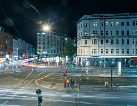 BERLIN - October 8, 2016: Traffic moves through Rosenthaler Platz (Rosenthal Square) in Berlin on the night of October 8, 2016.のeditorial素材