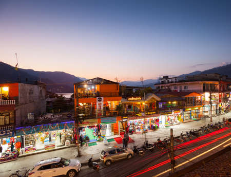 POKHARA, NEPAL - 08 November 2016: Twilight view of Lakeside Road main shopping area, 08 November...