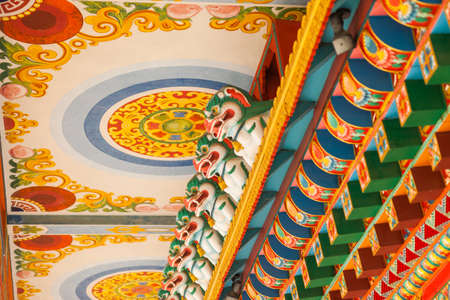 Brightly painted details at the Drigung Kagyud Lotus Stupa (German Temple), Lumbini, Nepalのeditorial素材