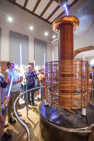BELGRADE, Serbia - 5 Sept: Tourists take part in a Tesla Coil demonstration at the Nikola Tesla Museum in Belgrade on 5 Sept 2017.のeditorial素材