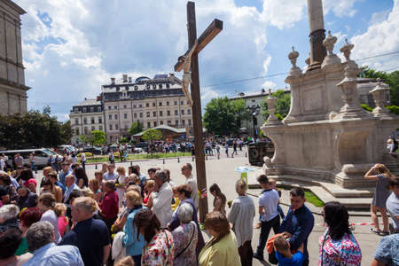 LVIV, UKRAINE - JUNE 18: The body of a pedestrian lays next to an overturned SUV on 18 June 2017 in Lviv, Ukraine. The accident occurred in front of a crowded church.のeditorial素材