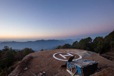 Helipad in the Himalayas overlooking a valley, Nepal